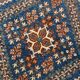 Vintage Turkish rug in brick red and indigo with floral design, 276 × 389 cm