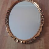 Miroir mural ovale en bois doré