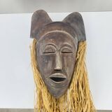 African ceramic and raffia mask signed BJ