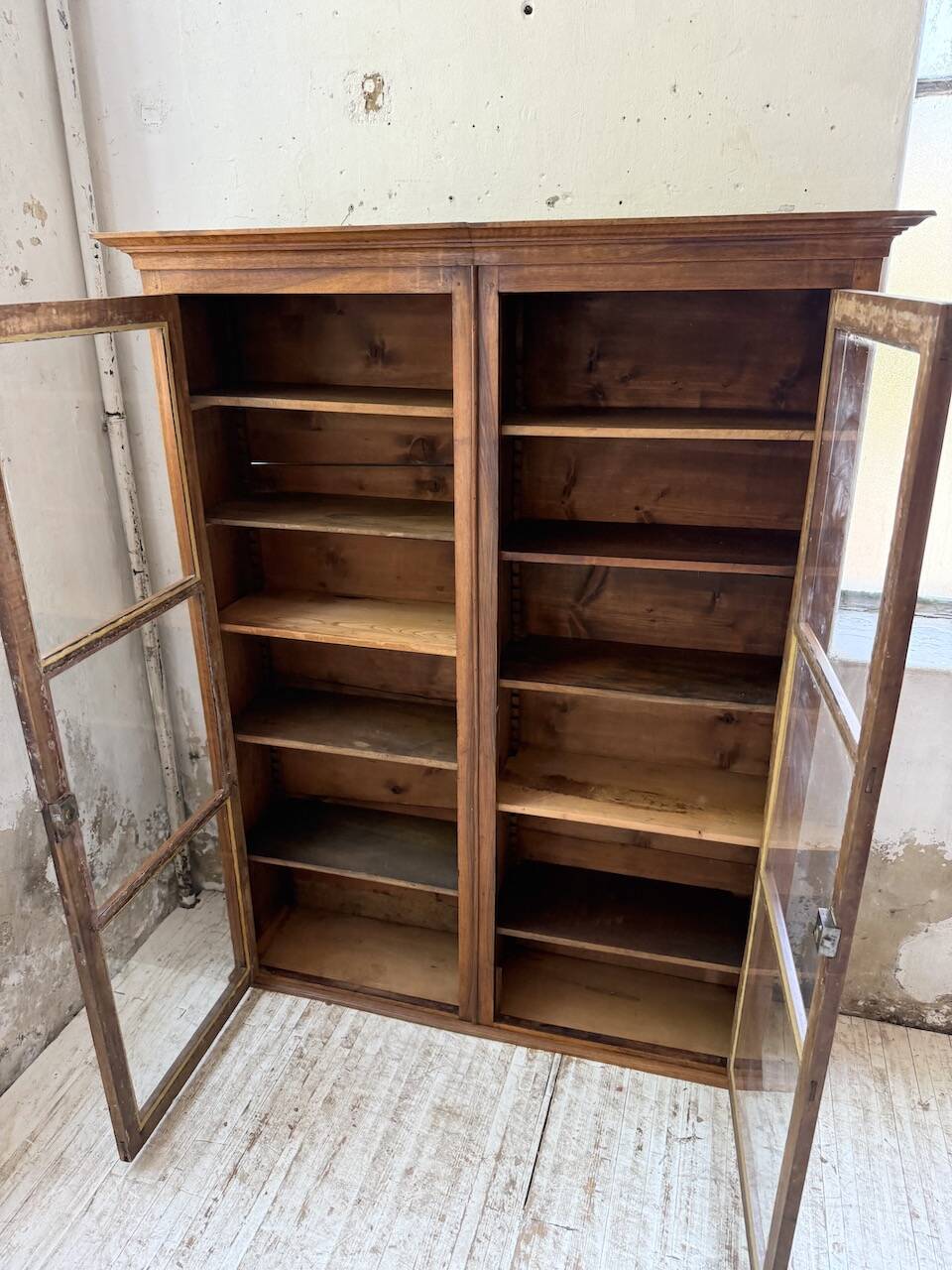 Glass-fronted walnut library 1900