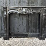 Louis XV style fireplace in black Belgian marble, circa 1880.