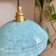 Blue suspension in clichy glass