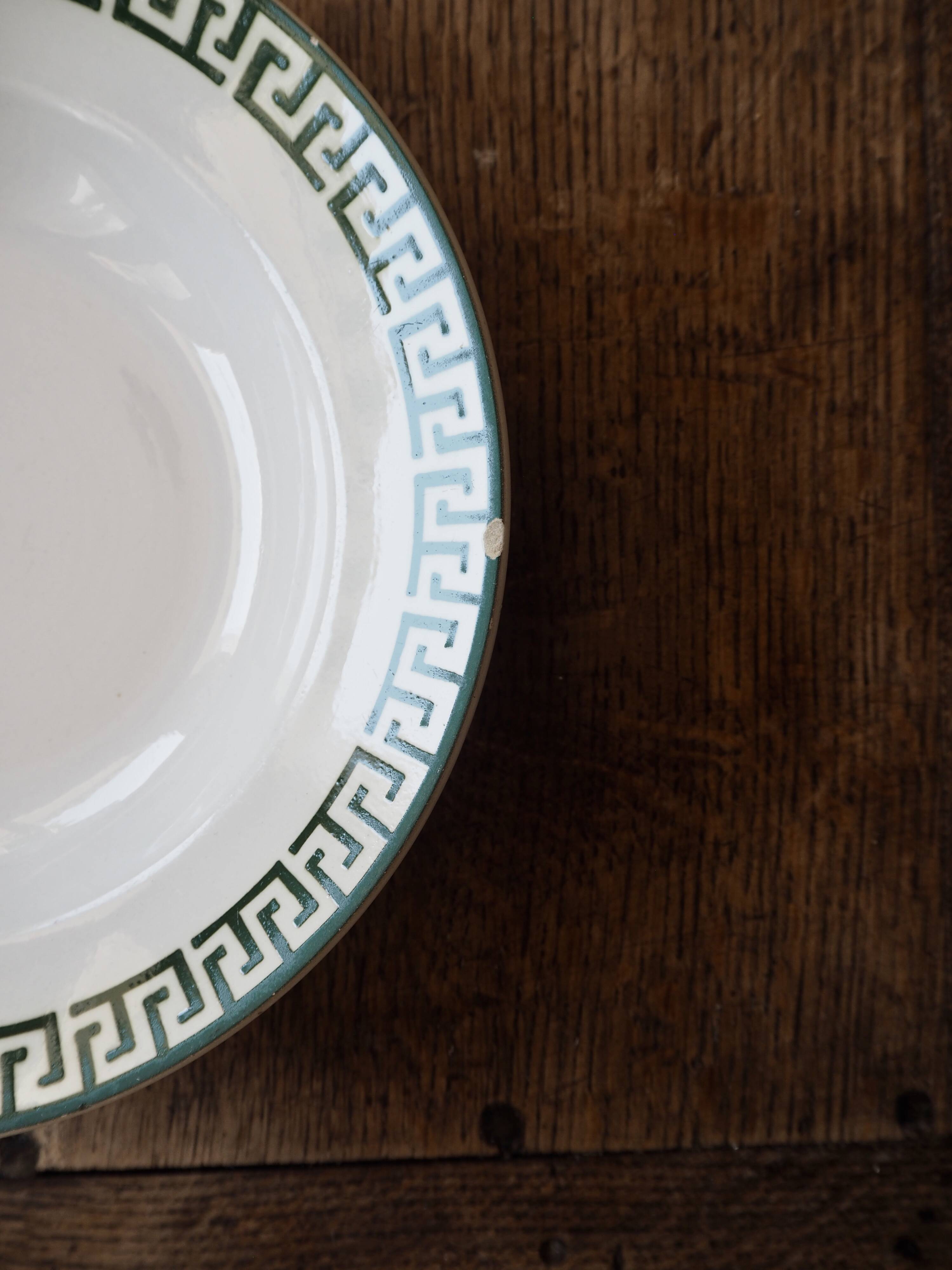 Set of 12 green patterned soup plates, Badonviller earthenware