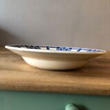 Round dish in ancient earthenware
