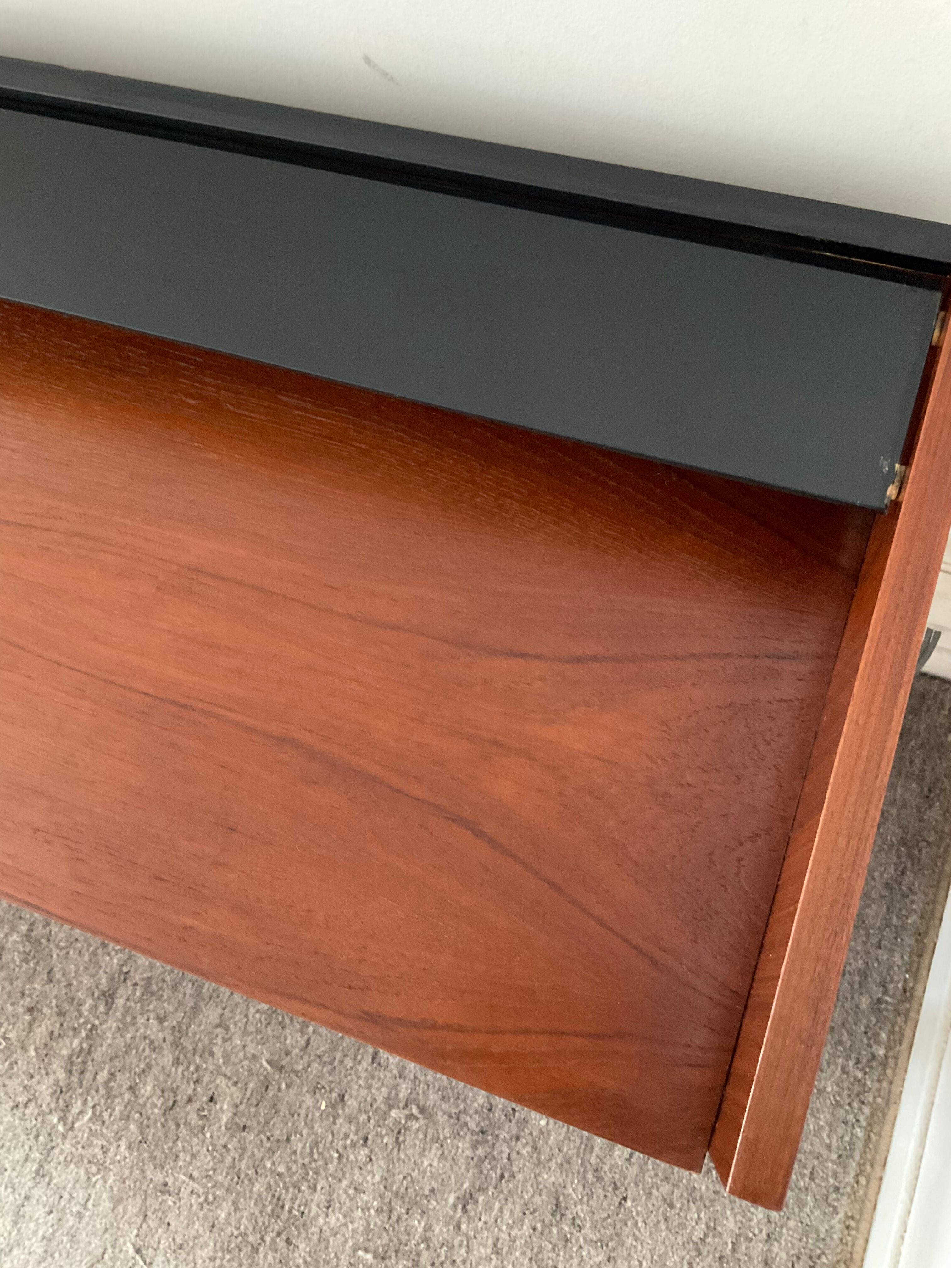 Scandinavian teak row from the 60s