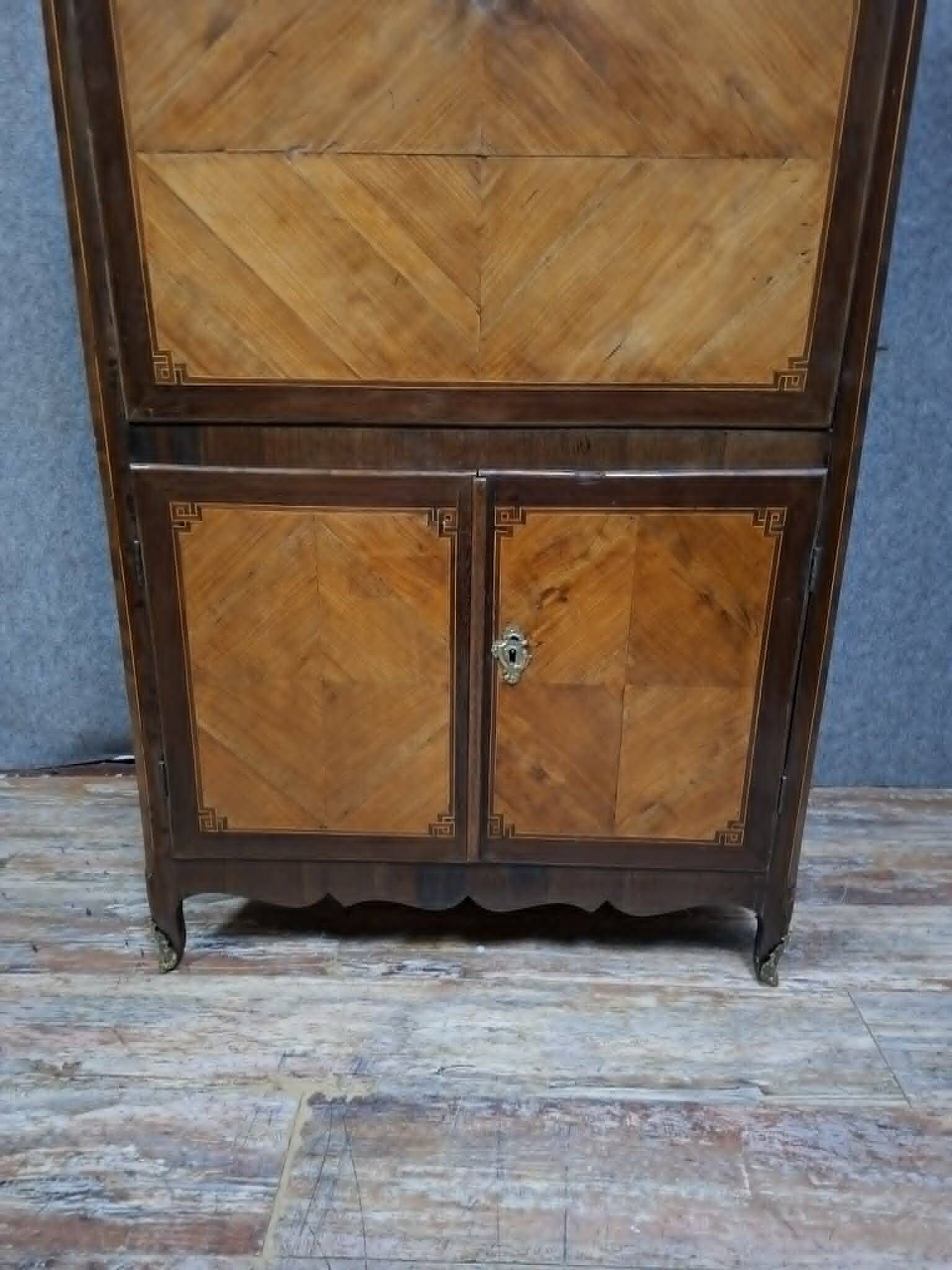 Louis XV period secretary in marquetry and veneer, 18th century.