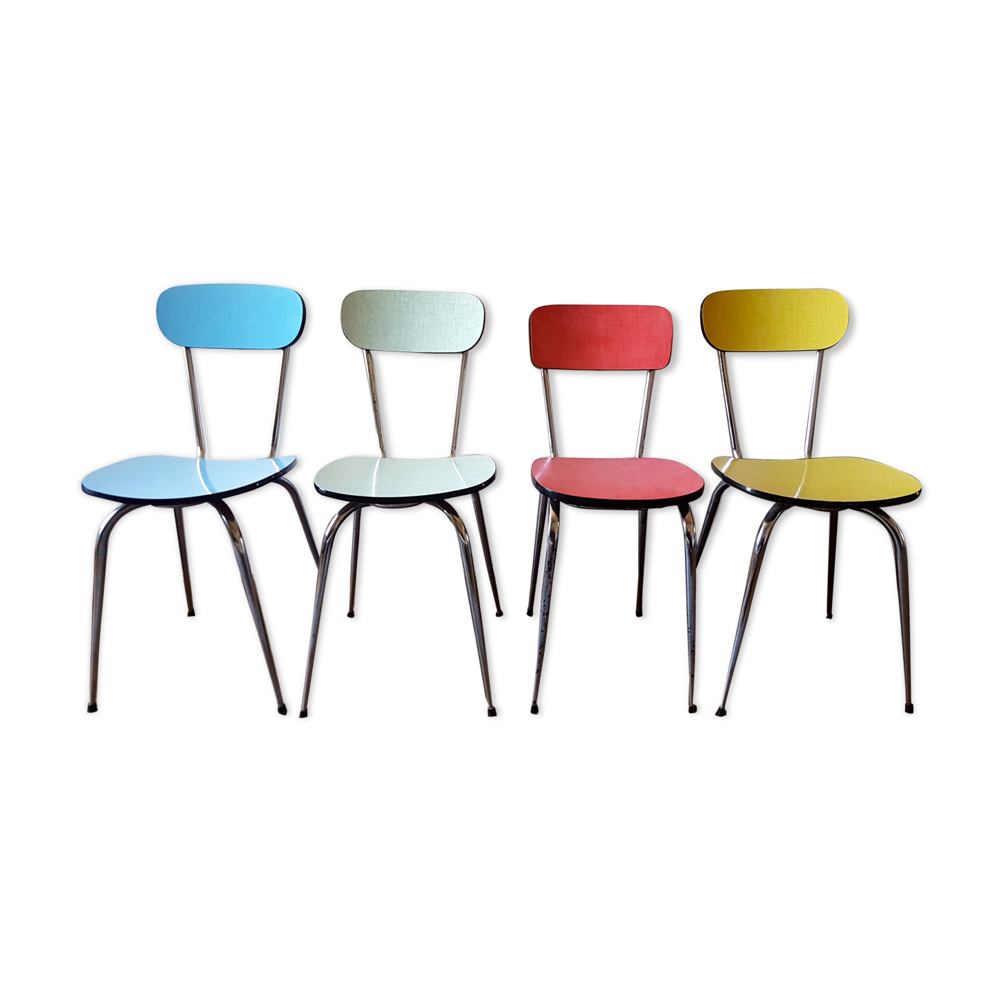 Four formica chairs in different colors