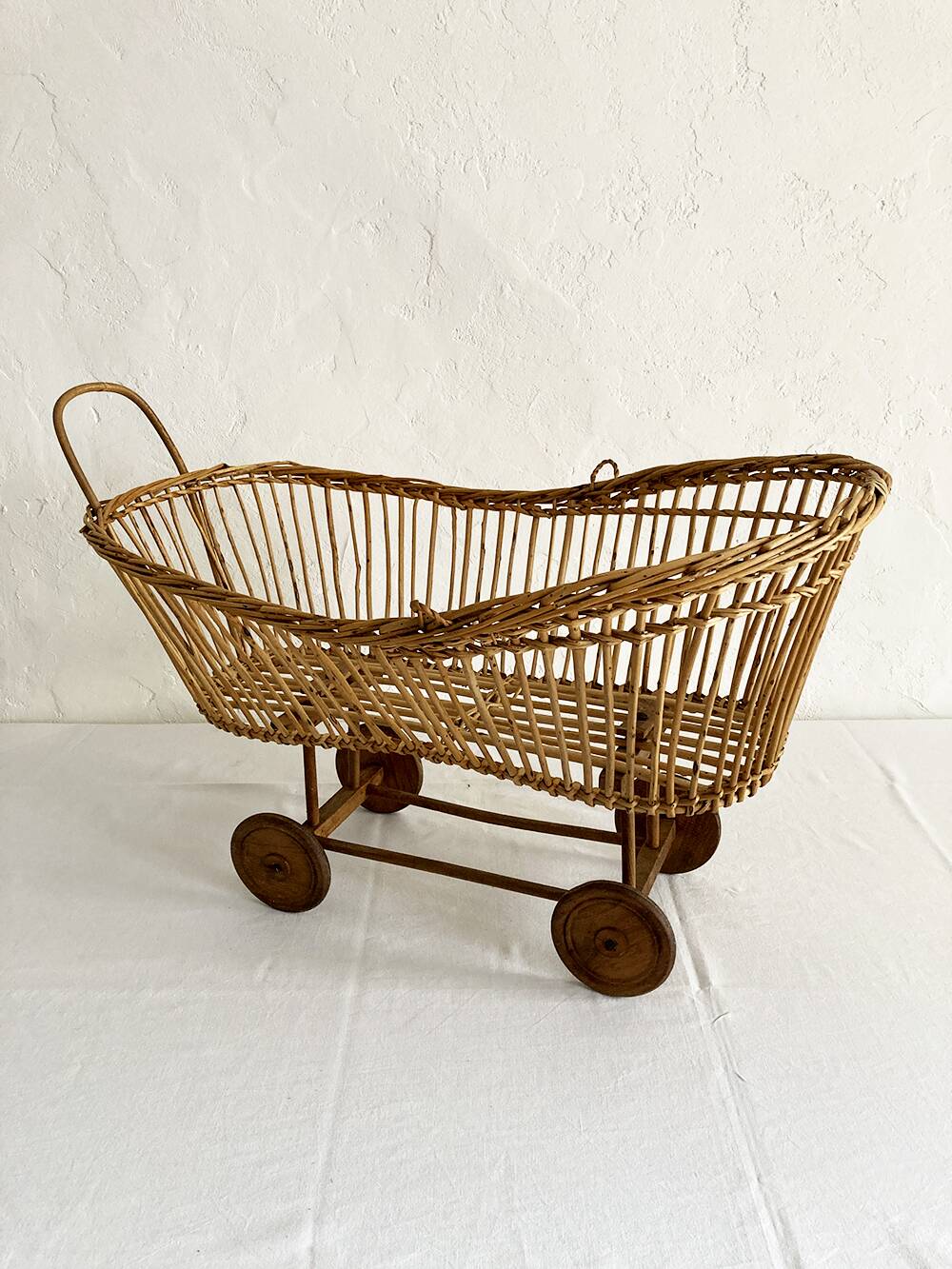 Old rattan doll's pram