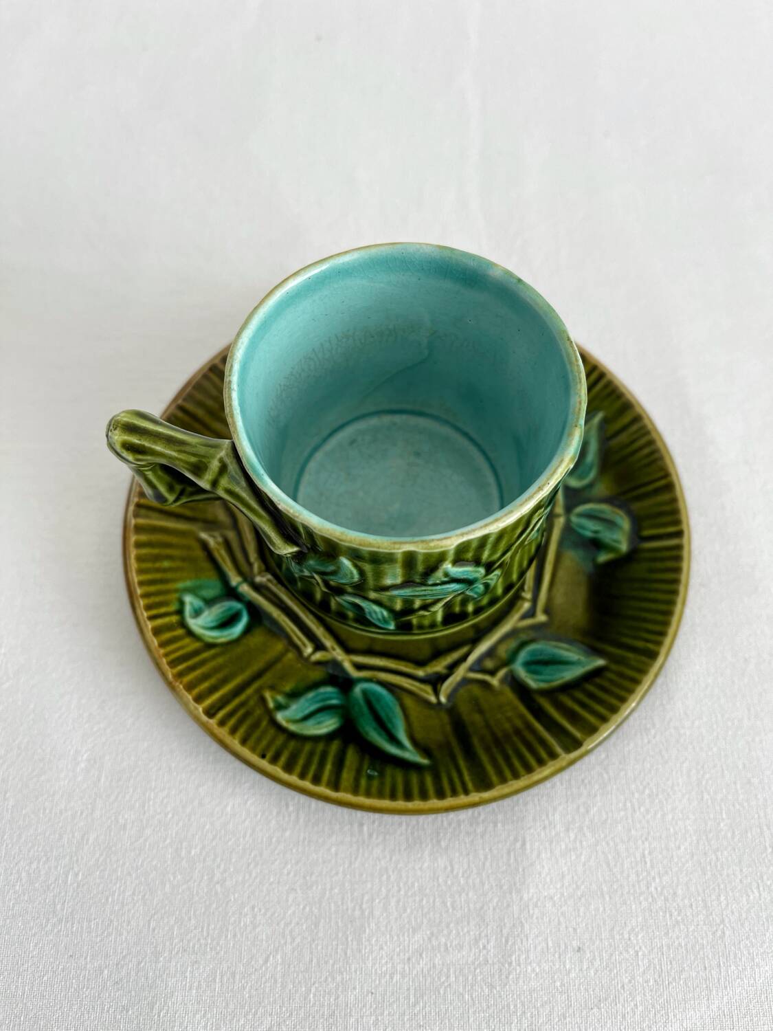 Antique earthenware coffee cup in bamboo slip