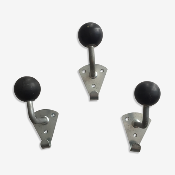 Vintage balls, metal and Bakelite hooks