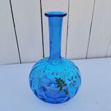 Vintage twisted blue glass carafe with enamel decoration.