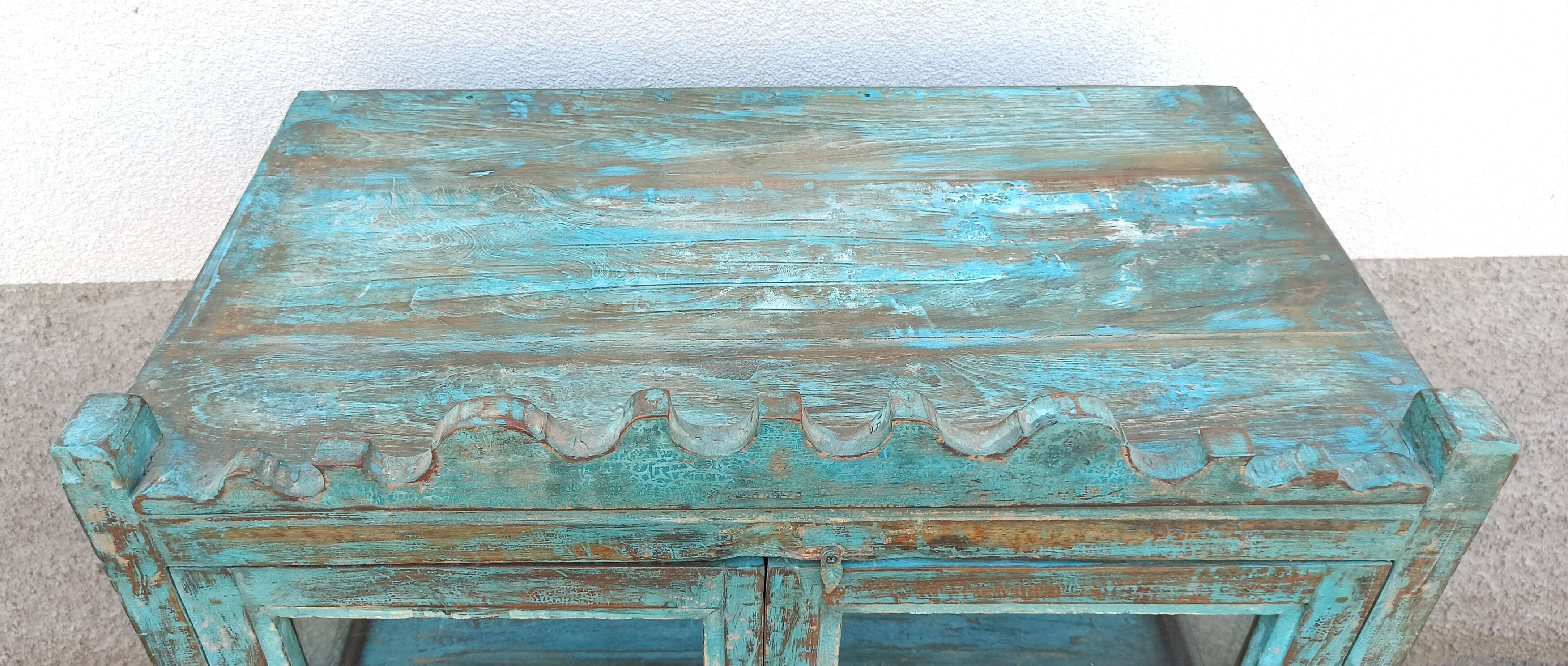 Blue wooden showcase