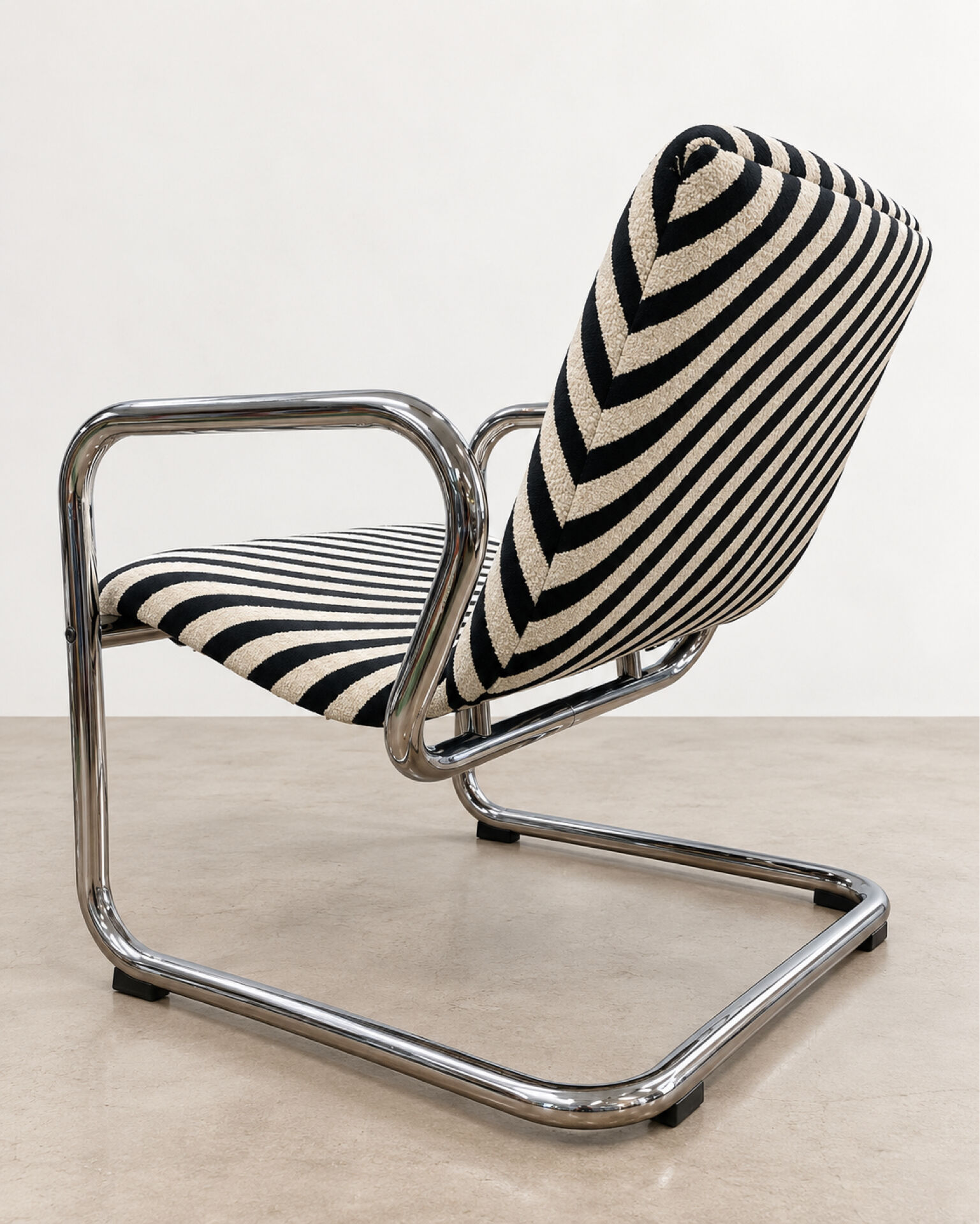 Restored vintage tubular chrome armchairs
