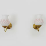 Pair of gooseneck wall sconces in gilded metal, white opaline with pink decorations