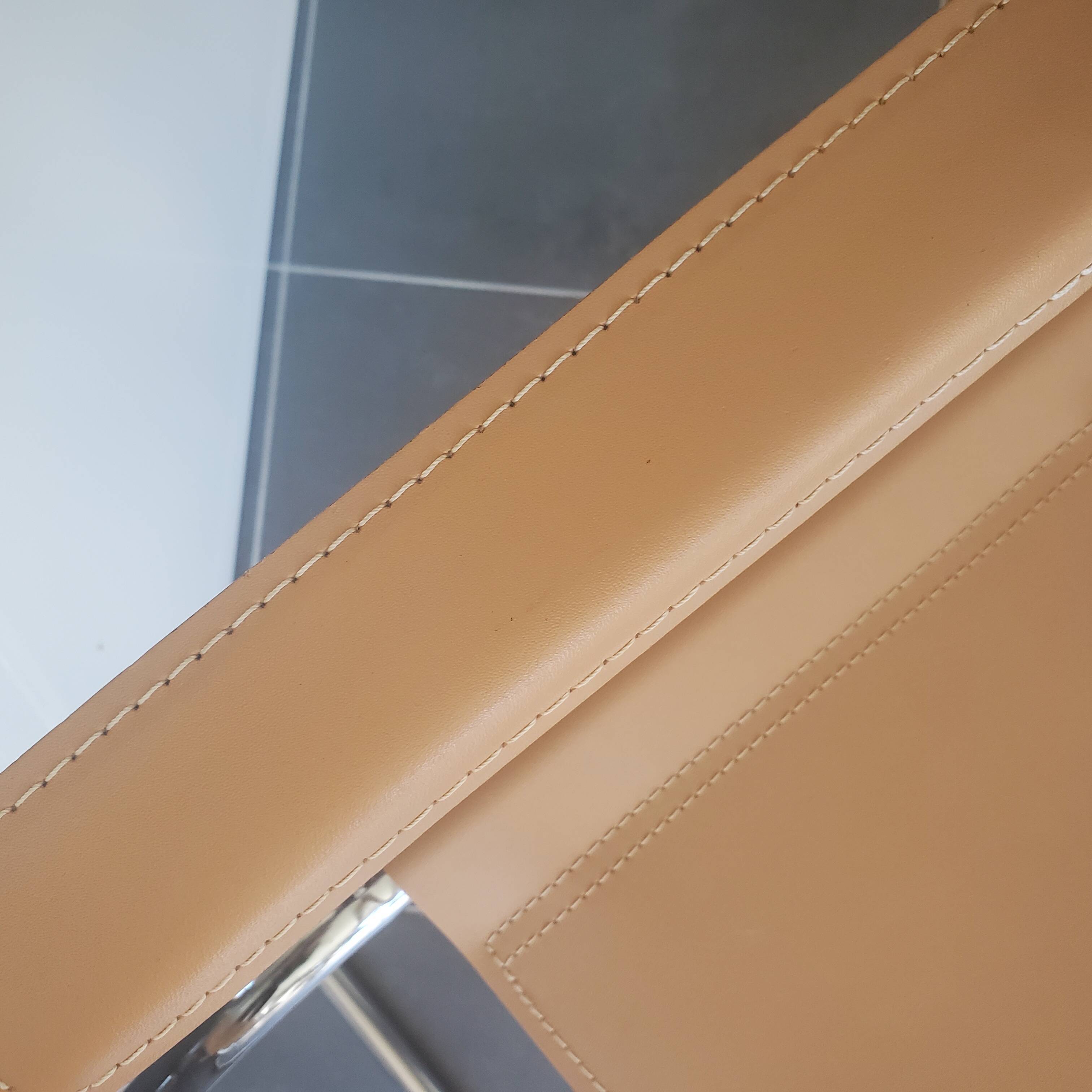 Beige leather armchair