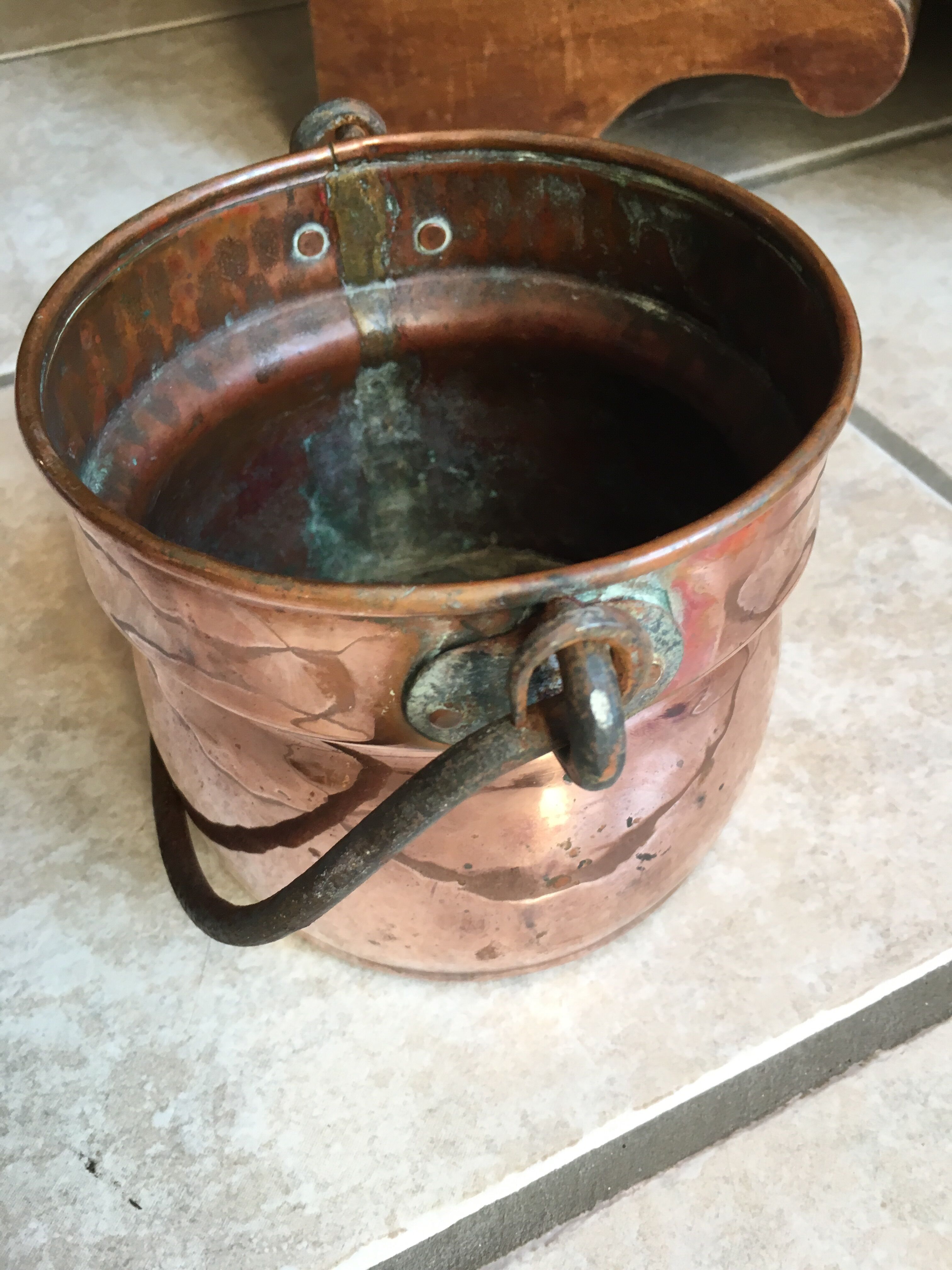 Old copper pot cover with cove