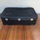 Former skai black travel suitcase