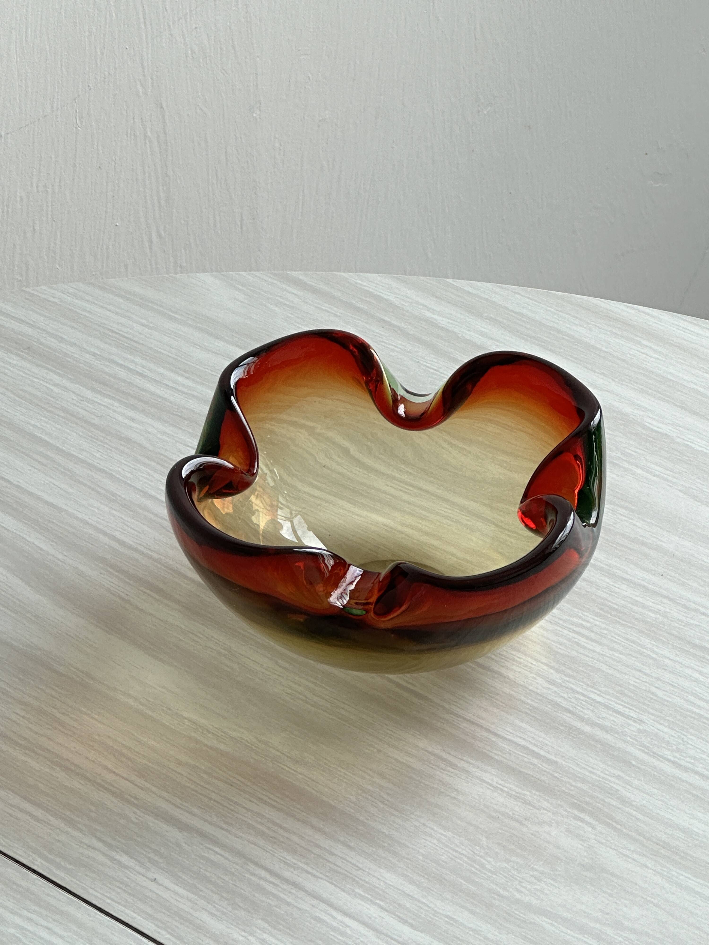 Retro thick glass ashtray.