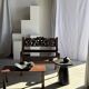 Black solid mango side table (monoxyle) with conical legs