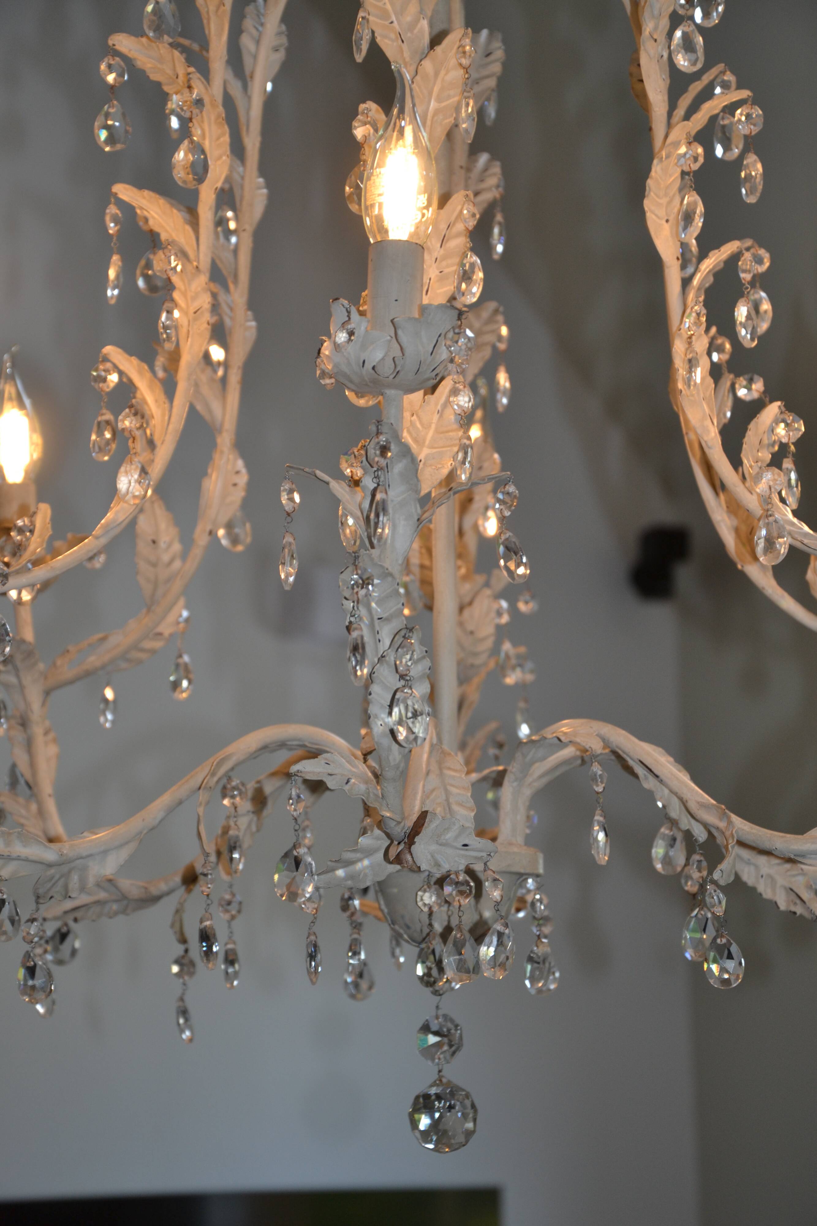 Large cage chandelier in aged metal.