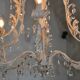 Large cage chandelier in aged metal.