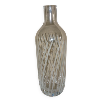 Chiseled glass bottle
