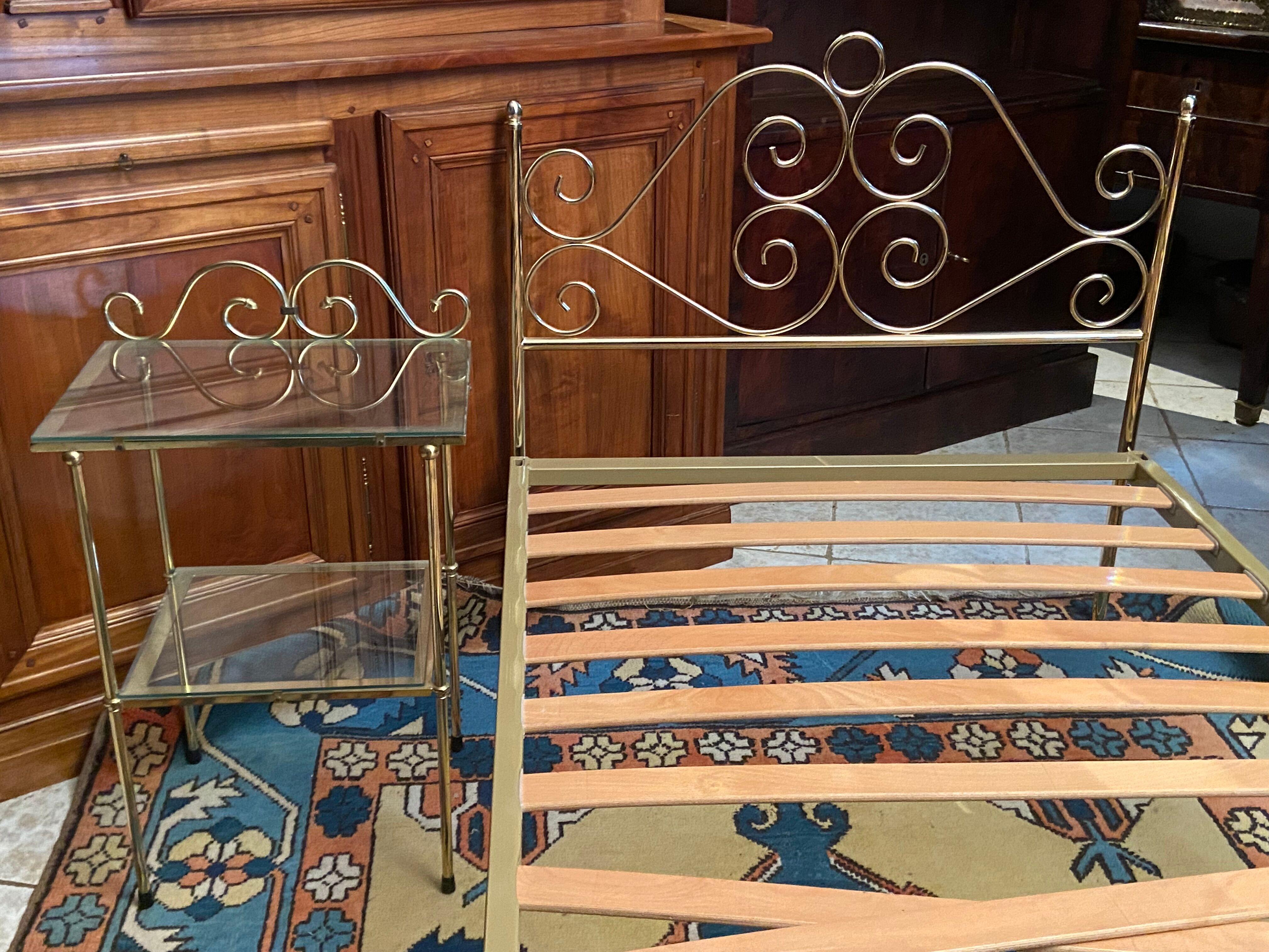 Romantic style single bed in brass with bedside table