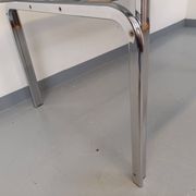 Vintage oval dining table in smoked glass and chrome metal, Space Age style.