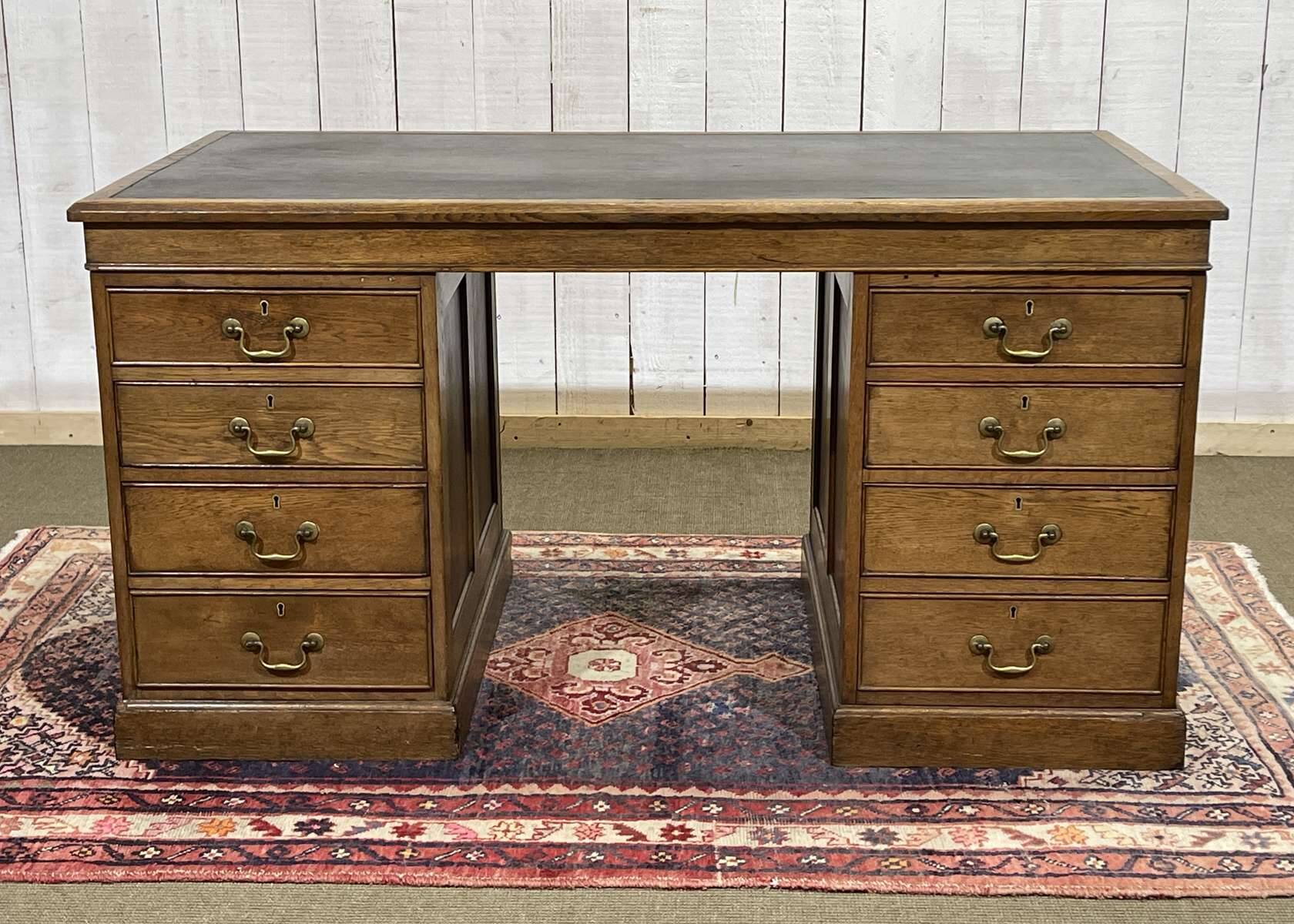 Early 20th century English flat desk in oak