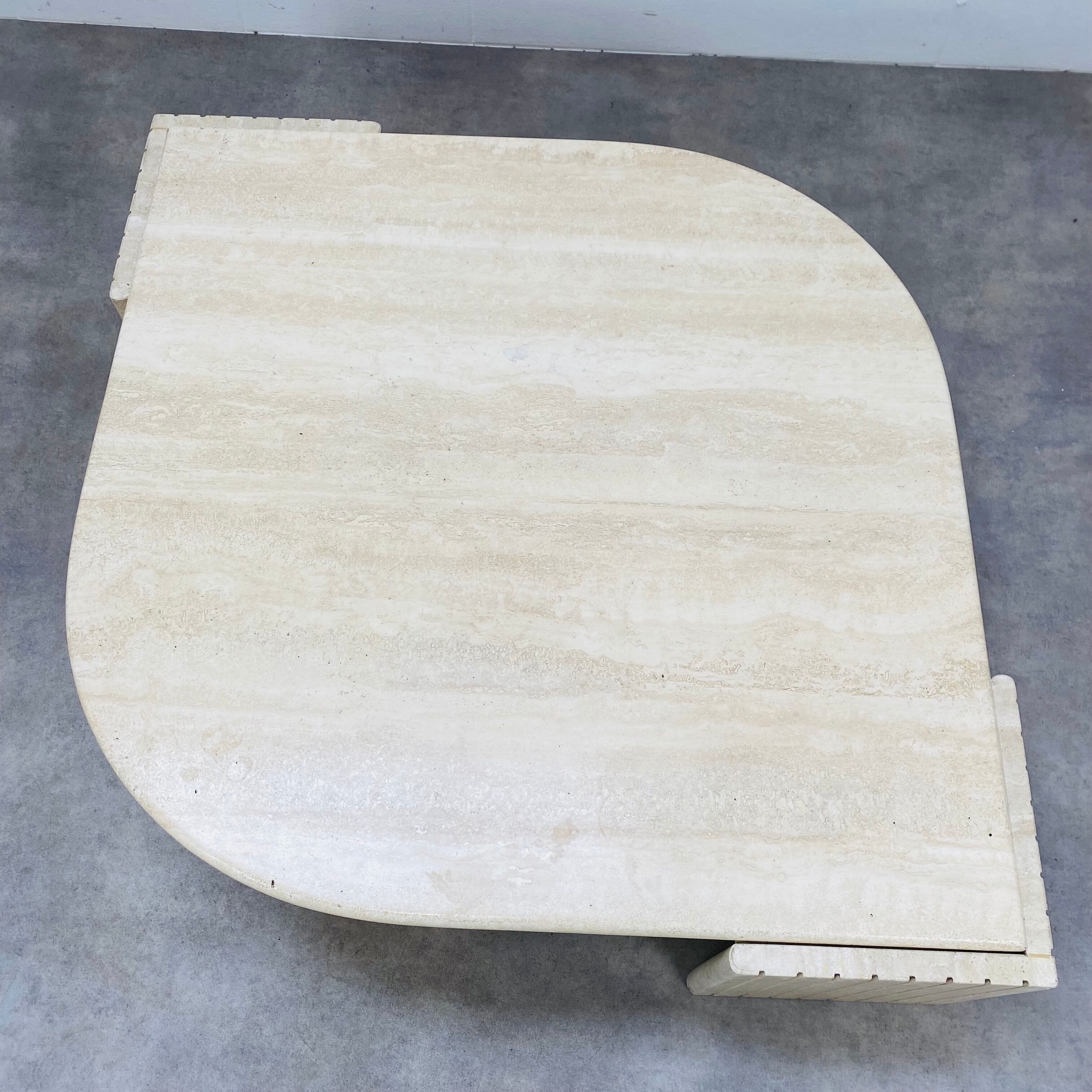 Travertine eye coffee table Roche Bobois