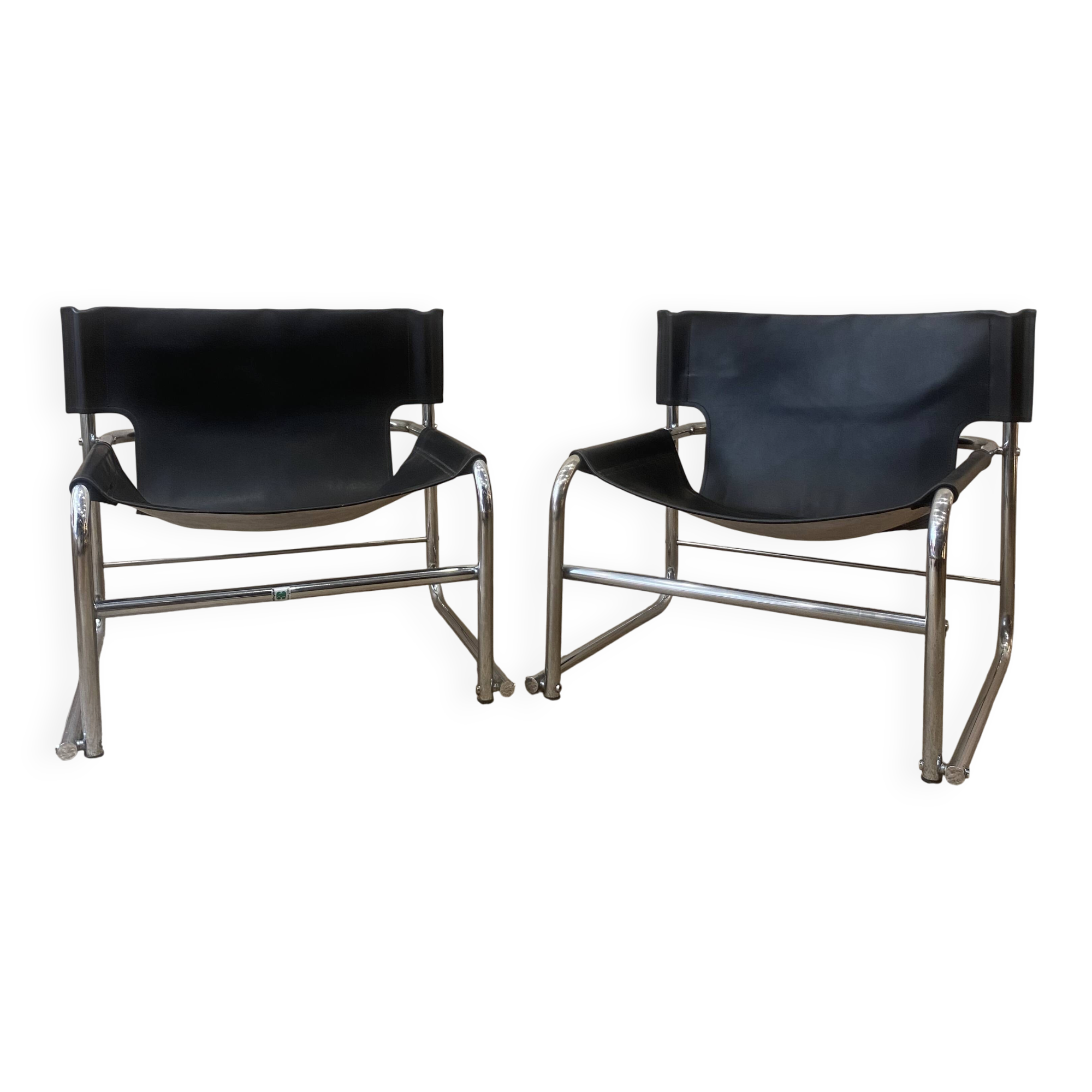Black leather armchairs with a metal frame by Rodney Kinsman.