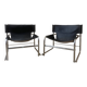 Black leather armchairs with a metal frame by Rodney Kinsman.