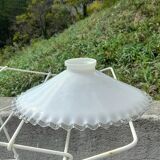 Serrated opaline suspension