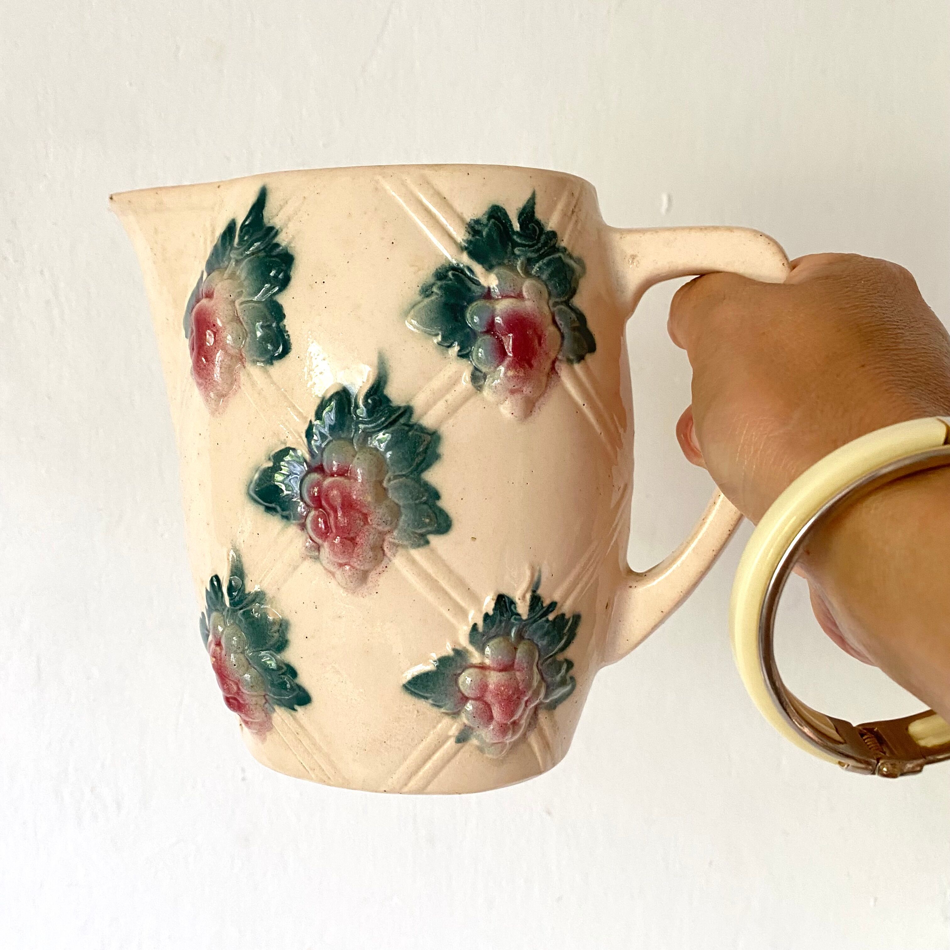 Antique pitcher in Digoin slip