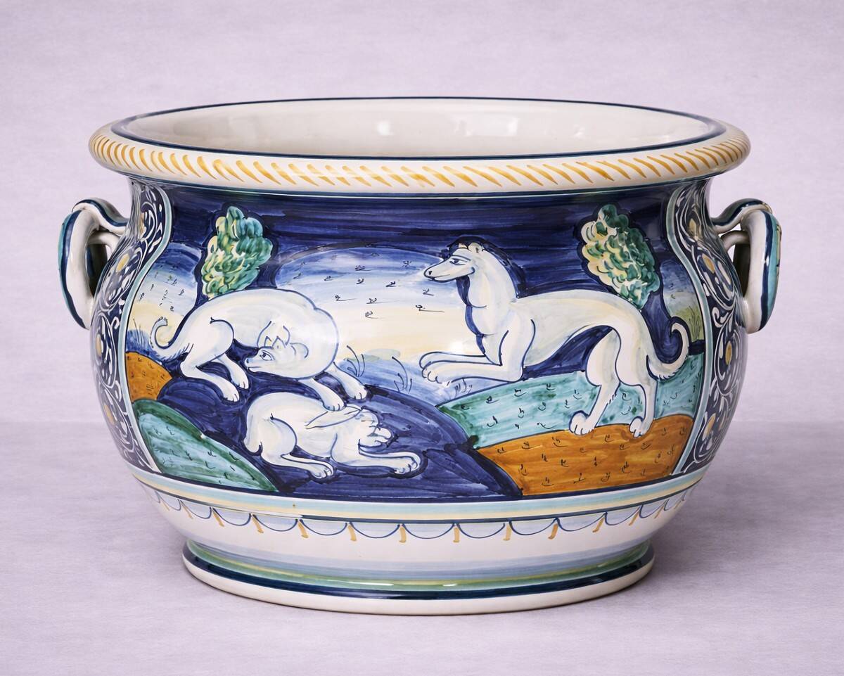 Italy early 20th century: Large cachepot or planter in glazed earthenware.
