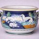 Italy early 20th century: Large cachepot or planter in glazed earthenware.