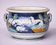 Italy early 20th century: Large cachepot or planter in glazed earthenware.