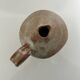 Patinated stoneware jug
