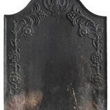 Old cast iron fireplace plaque