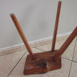 Raw wooden tripod stool