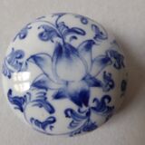 Porcelain pill box decorated with blue and white flowers