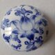 Porcelain pill box decorated with blue and white flowers