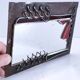 Brutalist mirror in metal and set glass