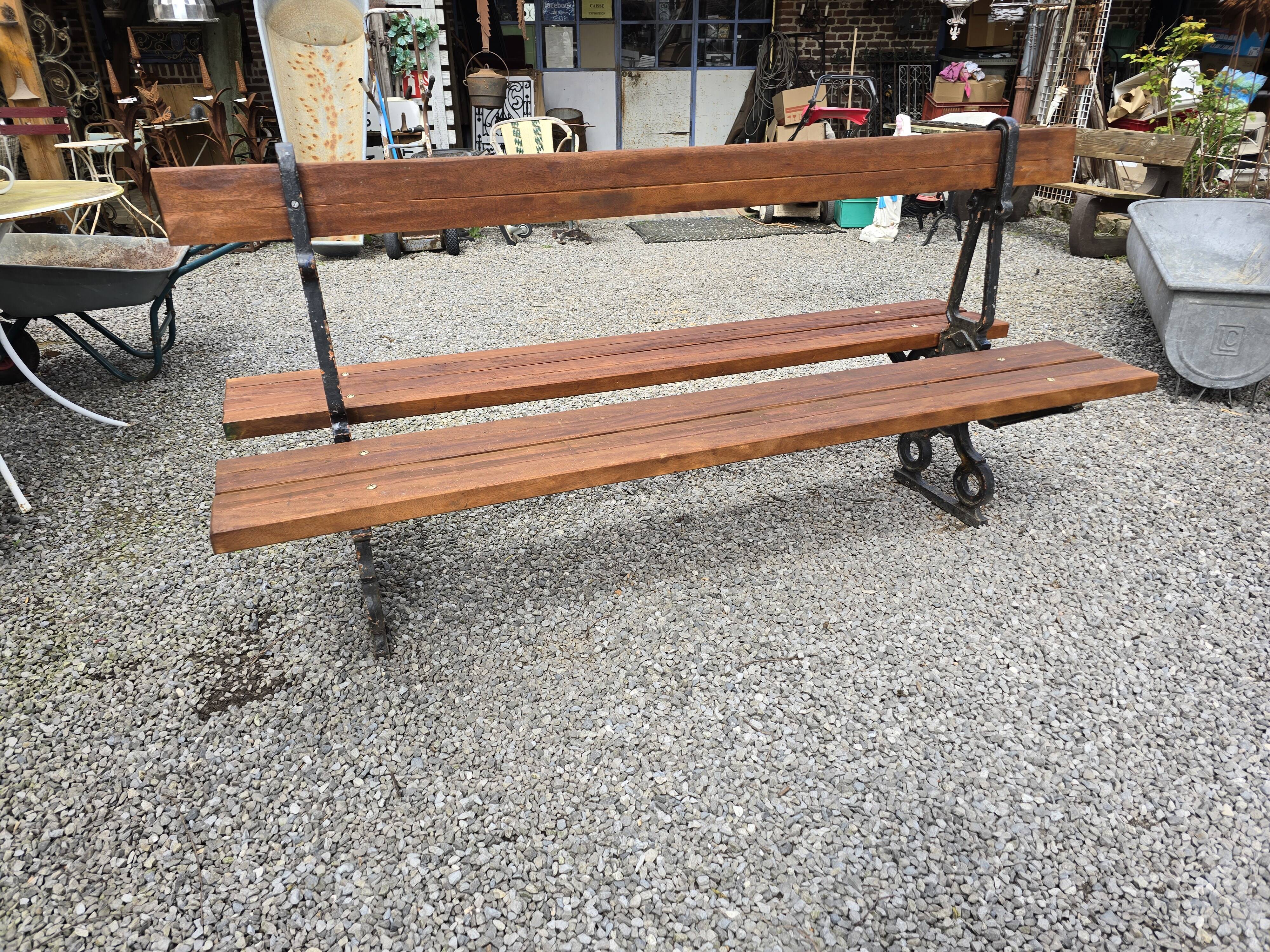 Public garden bench in the city of Paris