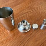 Shaker and five cocktail glasses