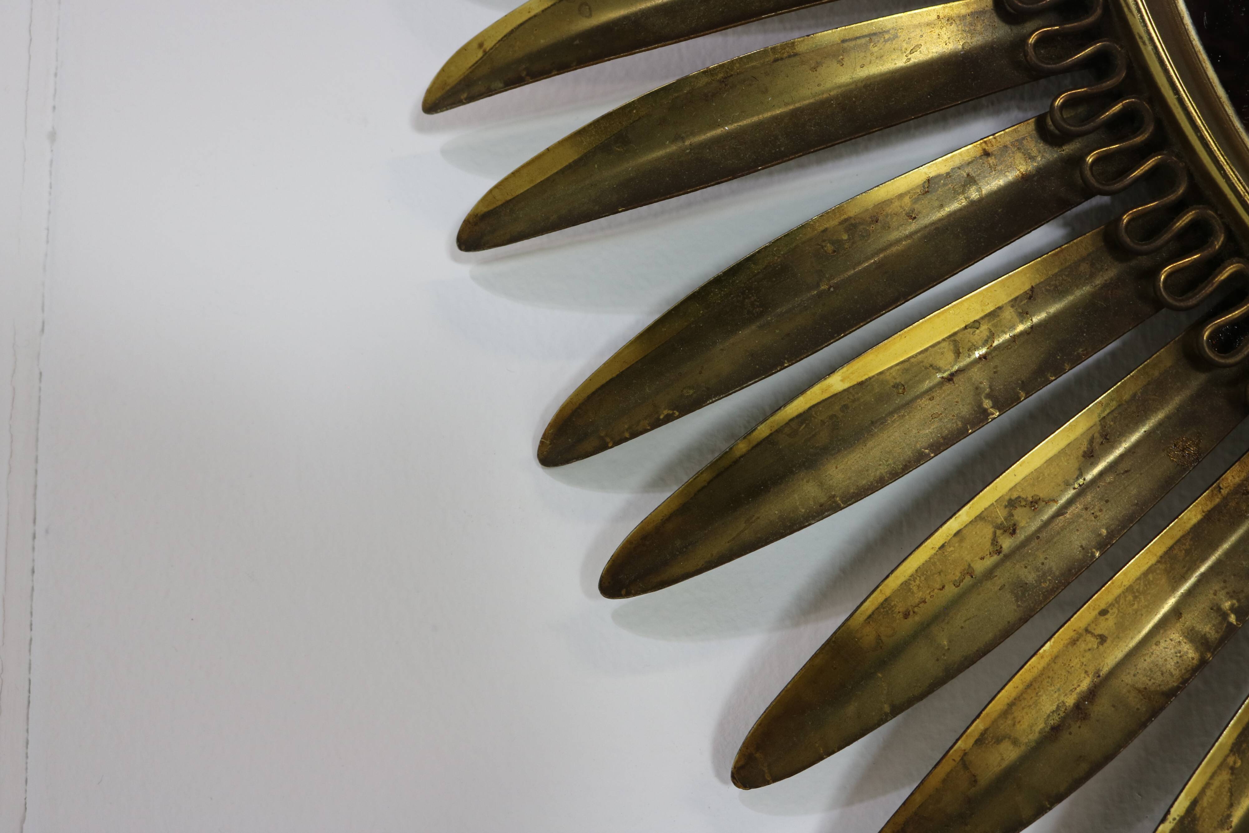 Typical midcentury sunburst wall mirror