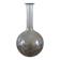 Antique glass carafe with a round belly and floral neck.