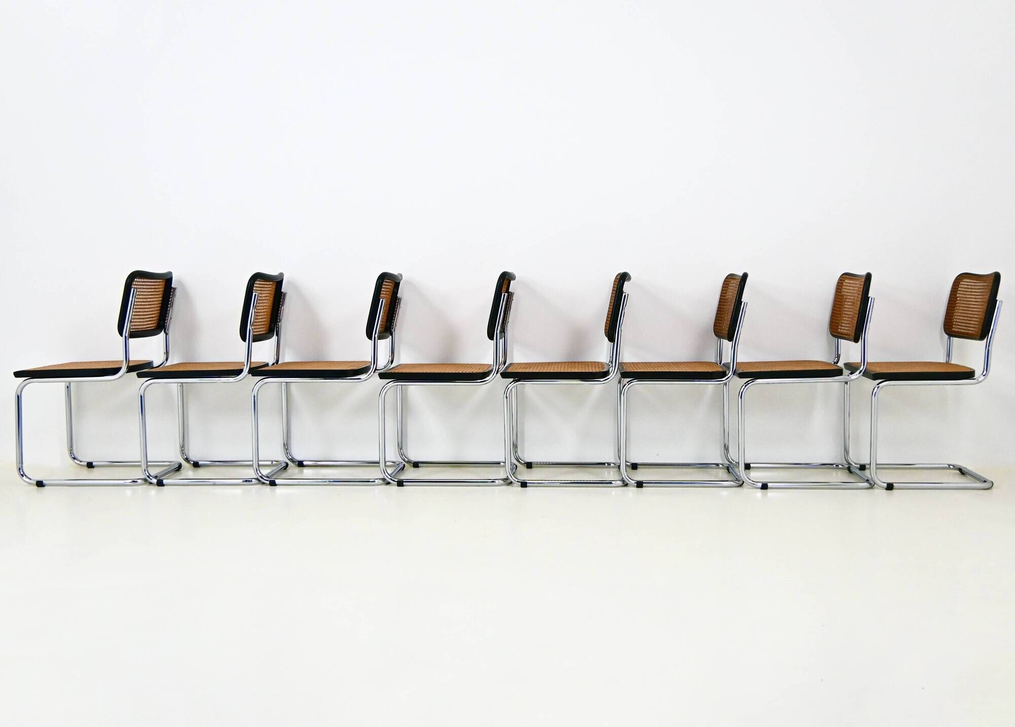 Set of 8 B32 model dining chairs by Marcel Breuer.