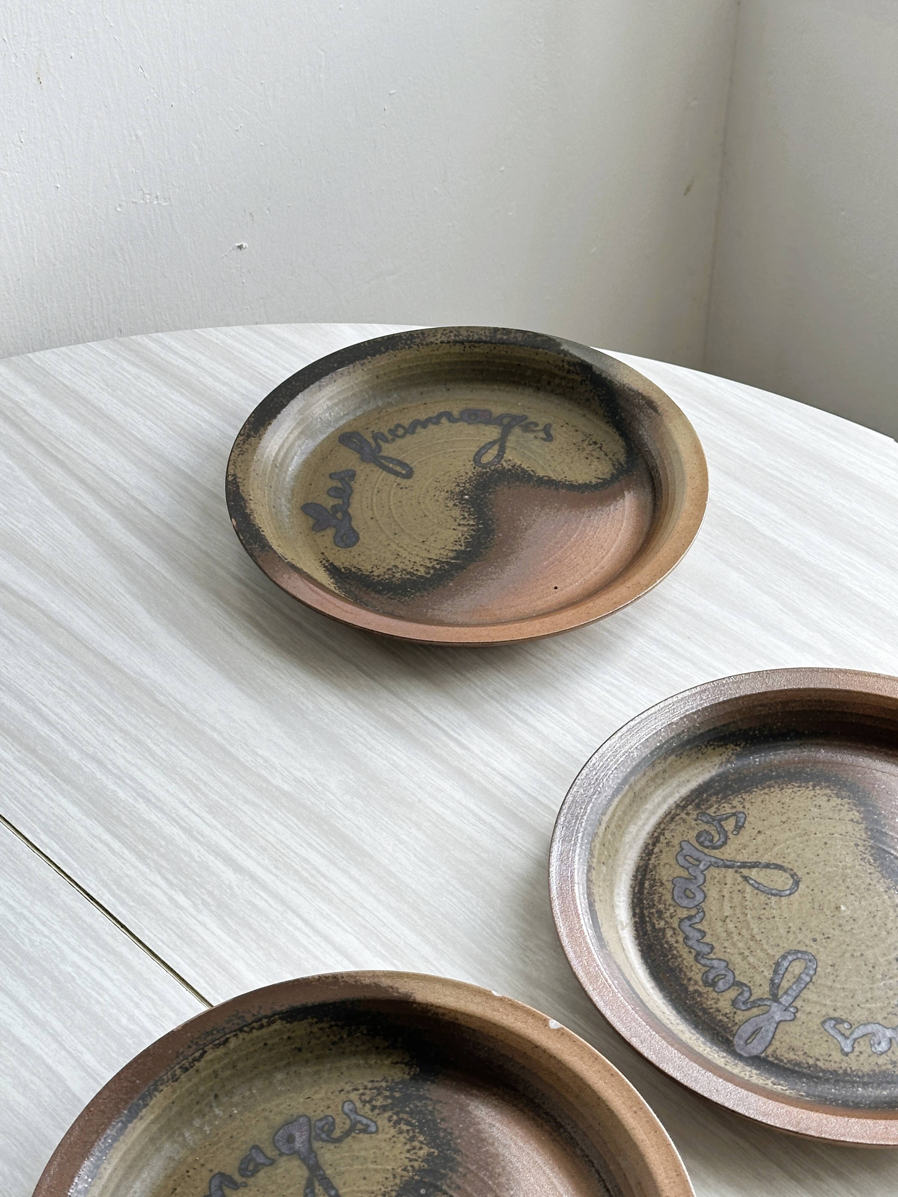 6 Arnon stoneware cheese plates.