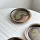 6 Arnon stoneware cheese plates.